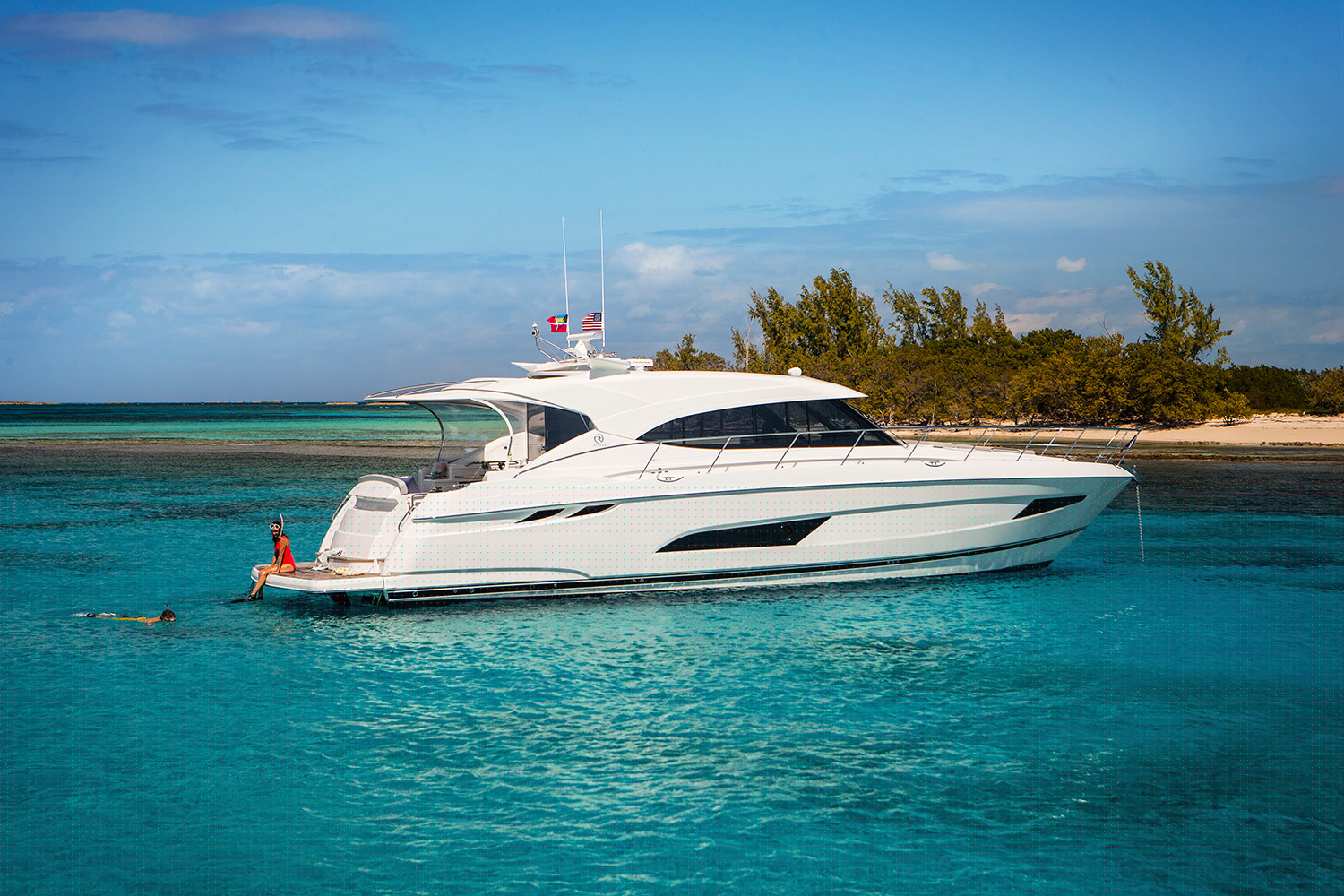5400SY---Riviera's-5400-Sport-Yacht's-hydraulic-swim-platform-is-the-perfect-platform-for-snorkelling-or-simply-relaxing-and-soaking-up-the-sun