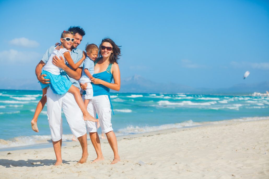 14107625 - family having fun on tropical beach